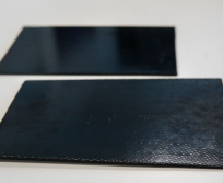 Plaques composites carbone/phthalonitrile issues d’un procédé d’infusion RTM. (Photo IRT Saint Exupéry)